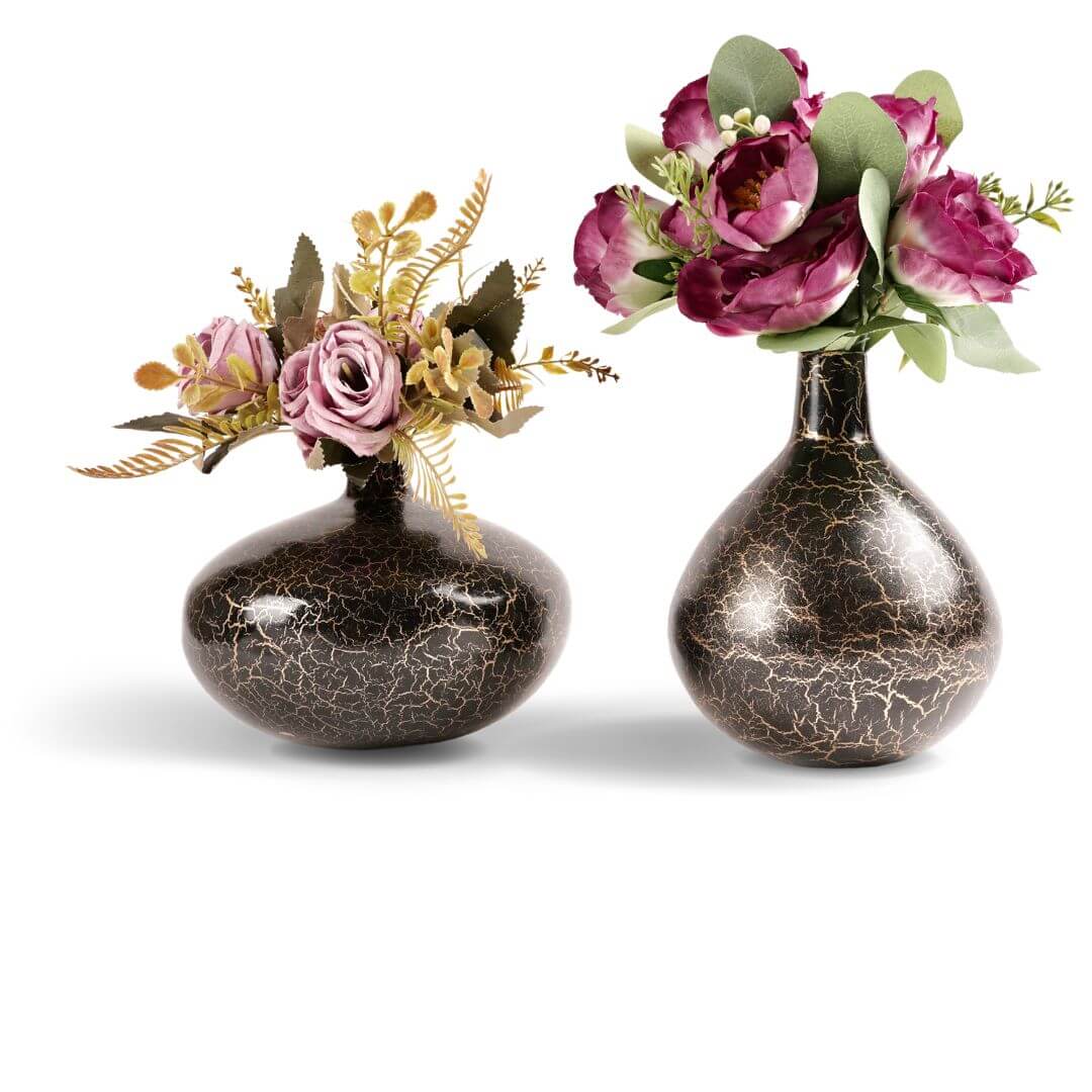 Metal vase with Pink artificial flowers in vase 